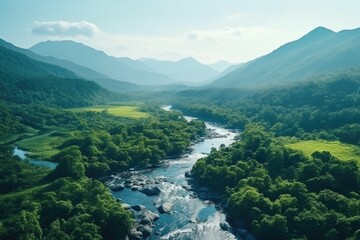 Sticker - A beautiful river flowing through a vibrant green valley. Ideal for nature and landscape concepts