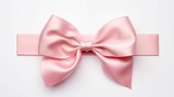 Fototapeta Przestrzenne - A delicate pink bow tied on a white background.
