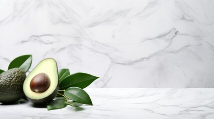 Wall Mural - avocado on a marble background. half an avocado on the table