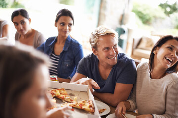 Friends, group and eating of pizza in home with laughing, soda or social gathering for bonding in dining room. Men, women or fast food with funny joke, drinks or diversity at table in lounge of house