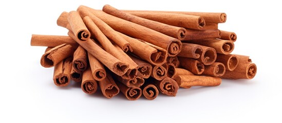 Aufkleber - Aromatic Cinnamon Sticks Scattered on Clean White Surface for Culinary Backgrounds