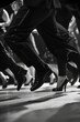 A group of tap dancers creating a symphony of sounds with their intricate footwork