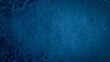 © Usman Ather - Arabic calligraphy wallpaper on a wall with a blue background and old paper interlacing. Translate 'Arabic letters'