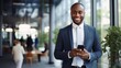 © tetxu - black businessman with phone in office