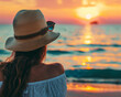 © JR-50 - Traveler relaxing on a beach chill lifestyle background of sea and sunset wearing a hat and sunglasses