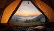view from the tent of sunrise, fog and mountains