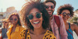 © carlesmiro - Group of multiracial young happy smiling friends wear sunglasses on street. Summer, vacations.