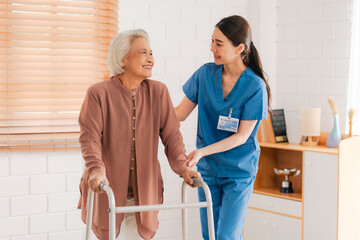 nursing home assistance in health insurance business concept, asian woman doctor or nurse caregiver support health care to elderly senior patient person, caretaker in medicals care recovery service