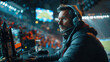 © Vladislav - a broadcaster sitting in a stadium sitting in front of a monitor