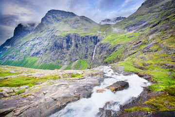 Wall Mural - Waterfall and mountains near the viewpoint over Trollstigen road, Norway