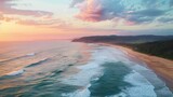 Fototapeta Natura - Aerial view of a beautiful sunset at the beach