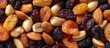 A mixture of almonds, raisins, and assorted nuts combined in a delicious blend for a healthy snack option.