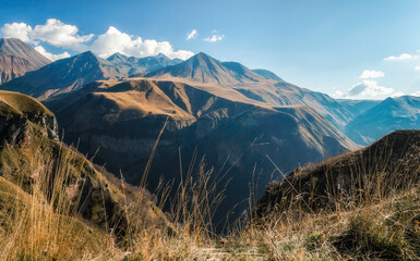 mountain landscape with blue sky and clouds