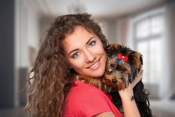 Poster - Happy mom play with adorable dog at home.