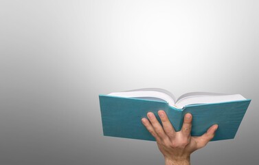 Poster - Person holding open reading book