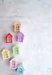 Real estate market concept with colorful wooden houses figurines