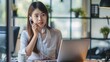 © Radetdararith - Asian Modern Businesswomen calling from her desk