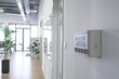 The air conditioning and heating control panel for the apartment and office is located on a white wall, Generative AI