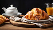 French croissant on a napkin on wooden table banner with copy space

