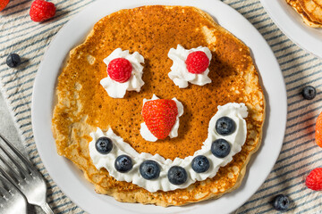 Wall Mural - Sweet American Smiley Face Breakfast Pancakes