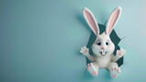 Fototapeta Lawenda - An amazed white rabbit with a look of wonder on its face is seen bursting through a blue wall