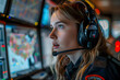 a united states emergency services call dispatcher speaking into their headset and with tracking maps on the screens