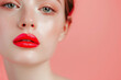 Close up portrait of beautiful young woman with red lips. Perfect skin.