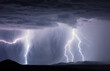 Thunderstorm lightning strikes. Stormy weather at night