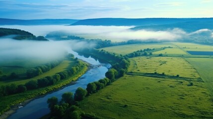 Sticker - A scenic view of a river running through a vibrant green field. Suitable for nature and landscape themes