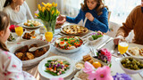 Fototapeta Na drzwi - Happy family at Easter dinner table with a lot of meals and eggs