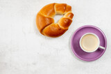 Fototapeta Miasto - Coffee and a butter croissant.