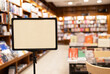 © ADDICTIVE STOCK - Empty signage board inside a cozy bookstore