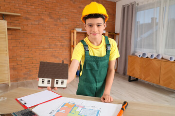 Poster - Little architect with house model in room