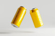 3D, Two yellow beer cans toasting, floating on air, against a white background