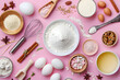 top view of assorted baking ingredients and utensils, isolated on a pastel pink background, representing baking and creativity in the kitchen 