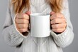 © Rose on Lens - Girl in white sweater holding white coffee mug, white porcelain mug mock-up