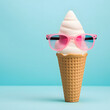 A quirky image of a vanilla ice cream cone donned with oversized pink sunglasses against a bright blue background, symbolizing fun and playfulness