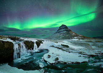 Wall Mural - aurora borealis or northern lights over kirkjufell mountain in iceland