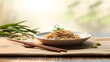 A perfectly served bowl of noodles sits on a wooden table with chopsticks, garnished with a green onion swirl