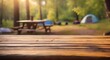 wooden table on blurred camping background