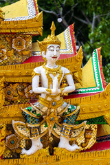 Wall Mural - Detail of the fairy statue stucco in Thai temple