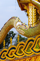 Wall Mural - Detail of the Naga statue stucco in THai temple