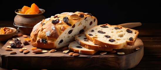 Wall Mural - A Loaf of Bread with Sesame Seeds on Wooden Table for Fresh Baking Concept