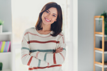 Poster - Portrait of positive stunning nice lady toothy smile crossed arms posing spacious modern house inside