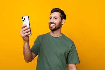 Sticker - Photo of attractive young man instagram twitter facebook telegram dressed stylish khaki clothes isolated on yellow color background