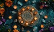 Zodiac signs on a stone plate with candles and flowers