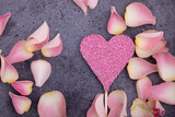 Fototapeta Panele - rose petals on wooden background