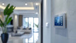 © vectorizer88 - Smart home control panel on wall, room entrance blurred