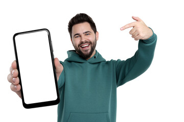 Canvas Print - Happy man holding smartphone with empty screen on white background