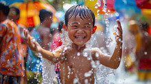 Boy Play Water Songkran Festival In Thailand